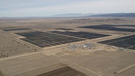 5K aerial stock footage orbiting a massive desert solar energy array in Antelope Valley, California Aerial Stock Footage | AX0005_123
