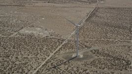 5K aerial stock footage orbit of a single windmill in the Mojave Desert of California Aerial Stock Footage | AX0005_128