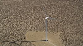5K aerial stock footage orbit lone windmill in the California Desert Aerial Stock Footage | AX0005_141