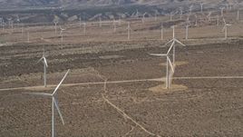 5K aerial stock footage orbiting a wind farm in the California Desert Aerial Stock Footage | AX0005_142