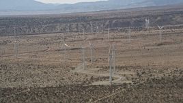 5K aerial stock footage circle a group of Mojave Desert windmills in Antelope Valley, California Aerial Stock Footage | AX0005_145