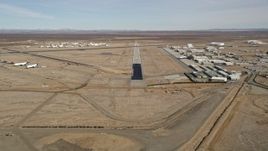 5K aerial stock footage approach runway at Mojave Air and Space Port in California Aerial Stock Footage | AX0006_054