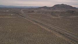 5K aerial stock footage approach Highway 14 in the Mojave Desert, California Aerial Stock Footage | AX0006_098