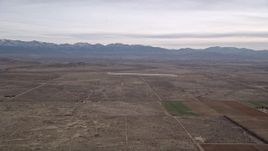5K aerial stock footage of VFX Background Plate of open desert and distant mountains, Mojave Desert, California Aerial Stock Footage | AX0006_114