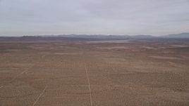 5K aerial stock footage tilt up and fly over open desert in California Aerial Stock Footage | AX0006_120