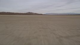 5K aerial stock footage of flying low over El Mirage Lake in the Mojave Desert of California Aerial Stock Footage | AX0006_138