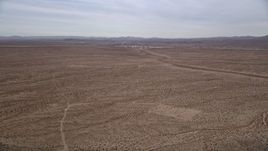 5K aerial stock footage of a Desert VFX Plate near small town of Helendale, California Aerial Stock Footage | AX0006_154