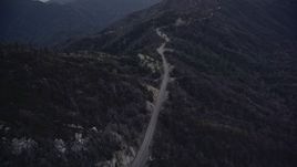5K aerial stock footage approach a mountain road at twilight in the San Gabriel Mountains, California Aerial Stock Footage | AX0008_039E