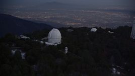 5K aerial stock footage orbiting around the Mount Wilson Observatory at twilight in California Aerial Stock Footage | AX0008_052E