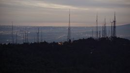 5K aerial stock footage of radio towers atop San Gabriel Mountains at twilight, California Aerial Stock Footage | AX0008_054