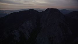 5K aerial stock footage of approaching peaks in the San Gabriel Mountains in California at twilight Aerial Stock Footage | AX0008_058