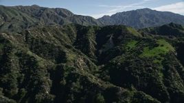 5K aerial stock footage of flying over green ridges in the San Gabriel Mountains, California Aerial Stock Footage | AX0009_003