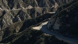5K aerial stock footage of tracking a motorcyclist on a road in the San Gabriel Mountains, California Aerial Stock Footage | AX0009_021