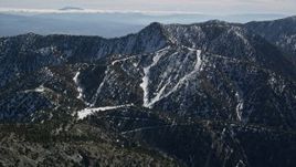 5K aerial stock footage of Mount Baldy Ski Lifts Skit Resort in winter, California Aerial Stock Footage | AX0009_065