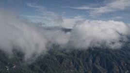 5K aerial stock footage of a cloud moving over the San Bernardino Mountains, California Aerial Stock Footage | AX0009_082E