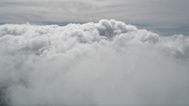 5K aerial stock footage fly over cloud cover in San Bernardino County, California Aerial Stock Footage | AX0009_094E