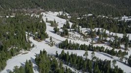 5K aerial stock footage orbit frozen slopes at Snow Summit Ski Resort in winter, California Aerial Stock Footage | AX0009_130