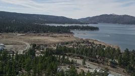 5K aerial stock footage tilt up from small town homes to reveal Big Bear Lake, California Aerial Stock Footage | AX0010_012