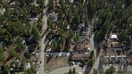 5K aerial stock footage of bird's eye of small town homes at Big Bear Lake in winter, California Aerial Stock Footage | AX0010_038