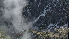5K aerial stock footage of bird's eye view of snowy slope in the San Jacinto Mountains, California Aerial Stock Footage | AX0010_070