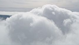 5K aerial stock footage flyby thick cloud cover over Southern California Aerial Stock Footage | AX0010_080