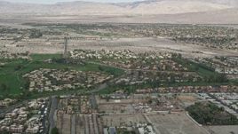 5K aerial stock footage orbit suburban homes on golf course in South Palm Springs, California Aerial Stock Footage | AX0010_139