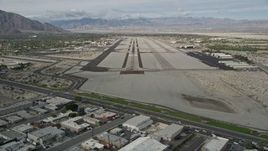 5K aerial stock footage of approaching the runway at Palm Springs International Airport, California Aerial Stock Footage | AX0010_144E