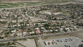 5K aerial stock footage orbit suburban neighborhoods in Cathedral City, California Aerial Stock Footage | AX0010_149