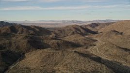 5K aerial stock footage flyby desert mountains, Mojave Desert, California Aerial Stock Footage | AX0011_049