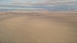 5K aerial stock footage of desert plains and mountains, Mojave Desert, California Aerial Stock Footage | AX0011_069