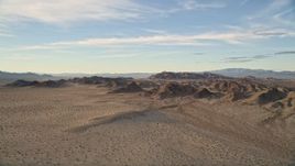 5K aerial stock footage fly by desert mountains, Mojave Desert, California Aerial Stock Footage | AX0012_045