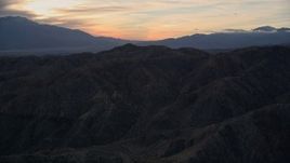 5K aerial stock footage of the desert mountains, Mojave Desert, California, sunset Aerial Stock Footage | AX0012_064