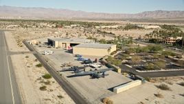 5K aerial stock footage fly by planes at the air museum, Palm Springs, California Aerial Stock Footage | AX0013_001
