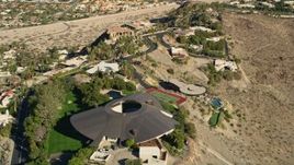 5K aerial stock footage of orbiting a hilltop mansion, West Palm Springs, California Aerial Stock Footage | AX0013_051E