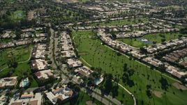 5K aerial stock footage fly over golf course and condominiums, Rancho Mirage, California Aerial Stock Footage | AX0013_069