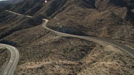 5K aerial stock footage approach a highway through San Jacinto Mountains, California Aerial Stock Footage | AX0014_003
