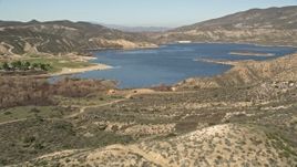 5K aerial stock footage of approaching Lake Hemet and Hemet Dam, California Aerial Stock Footage | AX0014_026