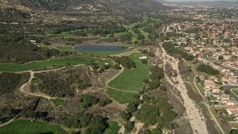 5K aerial stock footage of flying over a golf course, Temecula, California Aerial Stock Footage | AX0014_050