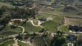 5K aerial stock footage of vineyards and a mansion, Temecula, California Aerial Stock Footage | AX0014_055