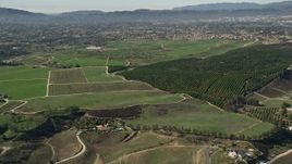 5K aerial stock footage flyby farmland and homes, Temecula, California Aerial Stock Footage | AX0014_067