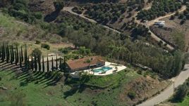 5K aerial stock footage of orbiting hilltop house, Fallbrook, California Aerial Stock Footage | AX0015_021