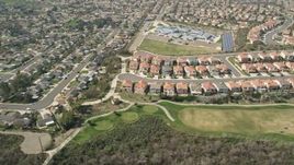 5K aerial stock footage of a residential neighborhood and school in Oceanside, California Aerial Stock Footage | AX0015_043