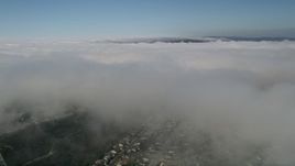5K aerial stock footage fly over a break in the cloud coverage, Laguna Niguel, California Aerial Stock Footage | AX0016_047