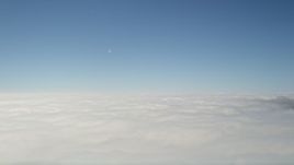 5K aerial stock footage flyby and pan across a cloud layer, blue skies above, California Aerial Stock Footage | AX0016_049