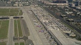 5K aerial stock footage of passenger jets at terminals, John Wayne Airport, Orange County, California Aerial Stock Footage | AX0016_083
