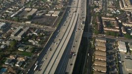 5K aerial stock footage of following Interstate 110 along residential area, Gardena, California Aerial Stock Footage | AX0017_028E