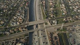 5K aerial stock footage of following Interstate 110 along residential area, Gardena, California Aerial Stock Footage | AX0017_030E