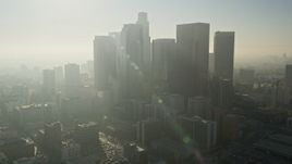 5K aerial stock footage tilt up revealing City Hall and skyscrapers, Downtown Los Angeles Aerial Stock Footage | AX0017_067