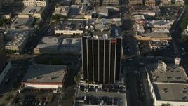 5K aerial stock footage approach and tilt down on CNN building, Hollywood, California Aerial Stock Footage | AX0017_083