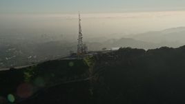 5K aerial stock footage of orbiting a hill top radio tower, Hollywood, California Aerial Stock Footage | AX0017_094